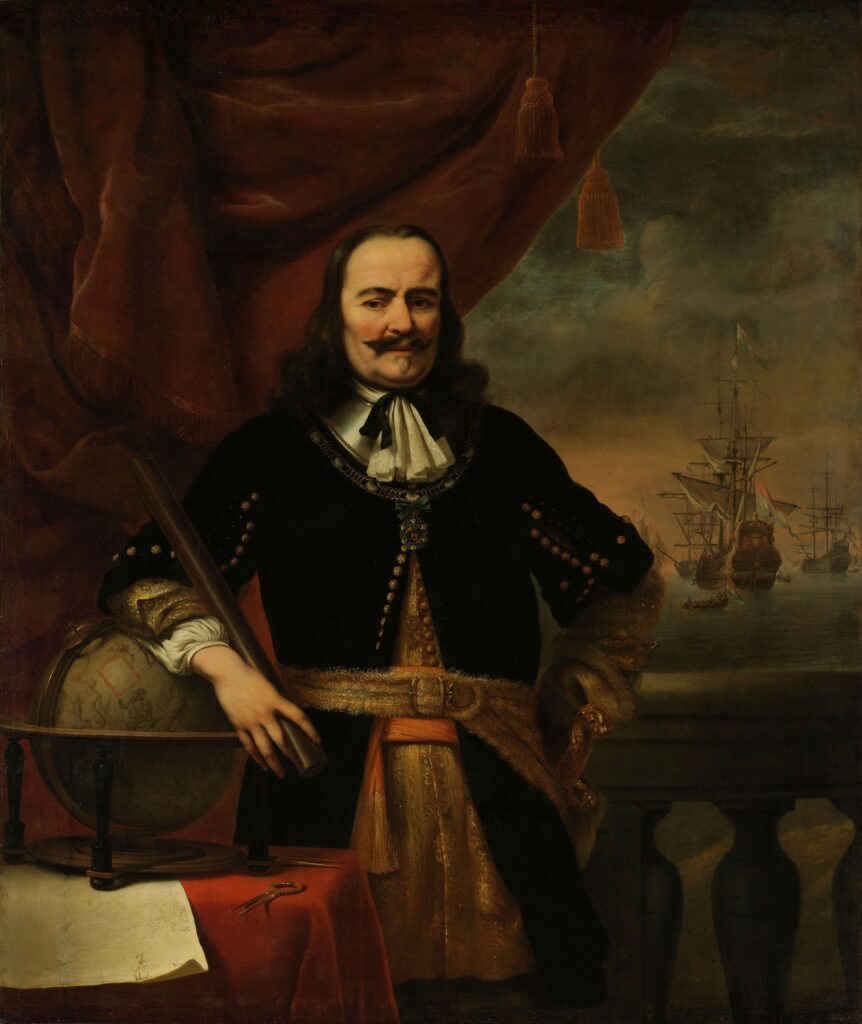 Portrait of Michiel de Ruyter by Ferdinand Bol. De Ruyter is standing with his right arm resting on a globe. He is a large man with long dark hair and moustache dressed in dark clothing. There are ships in the background behind him.,