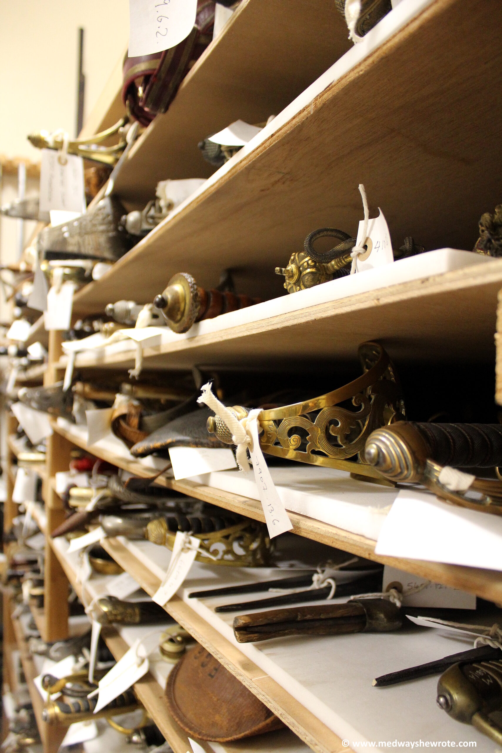 Shelves full of swords in the Royal Engineers Museum armoury.
