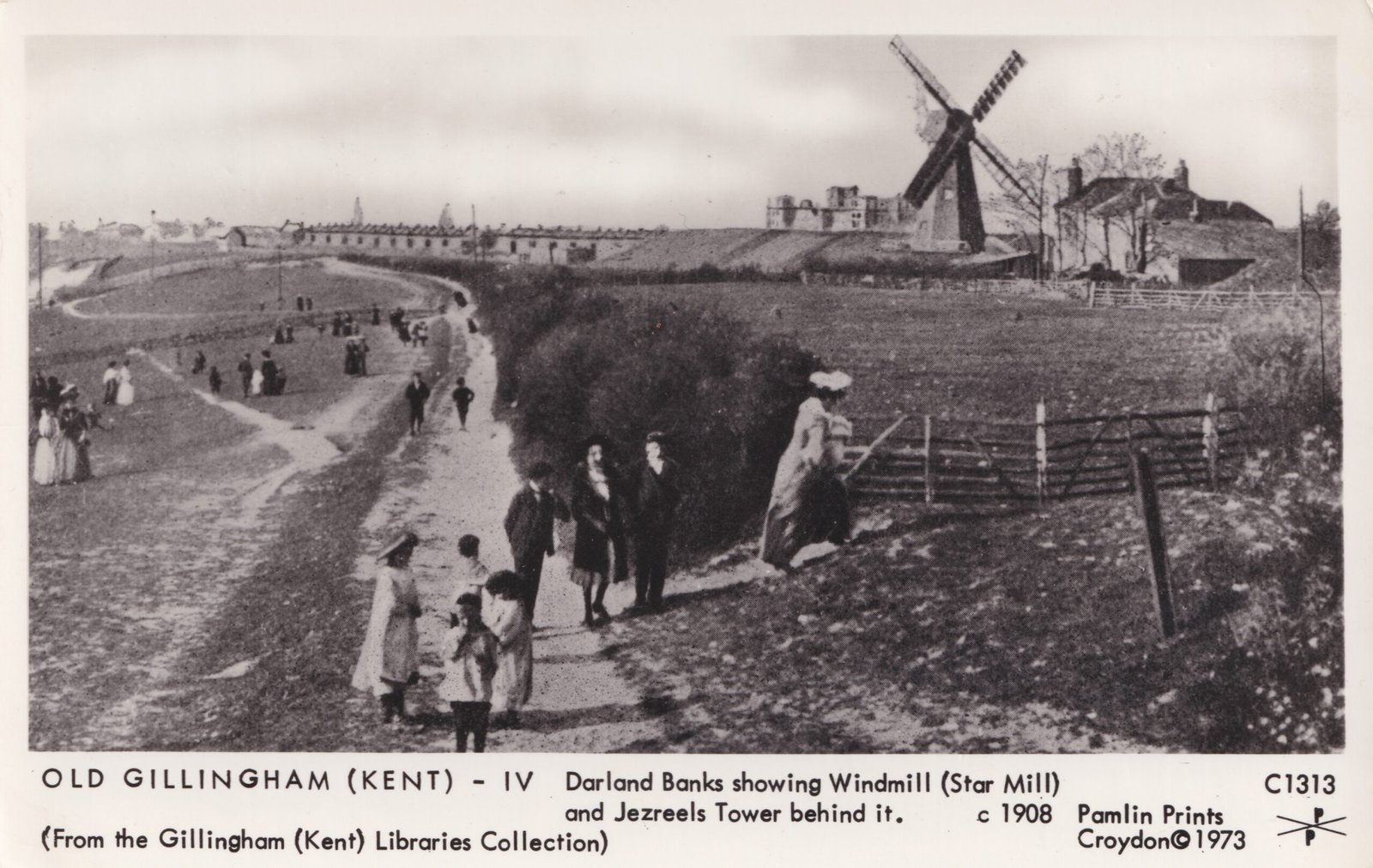 A black and white photographic postcard showing Darland Banks in Gillingham. Star Mill Windmill and Jezreel's Tower are visible in the distance.
