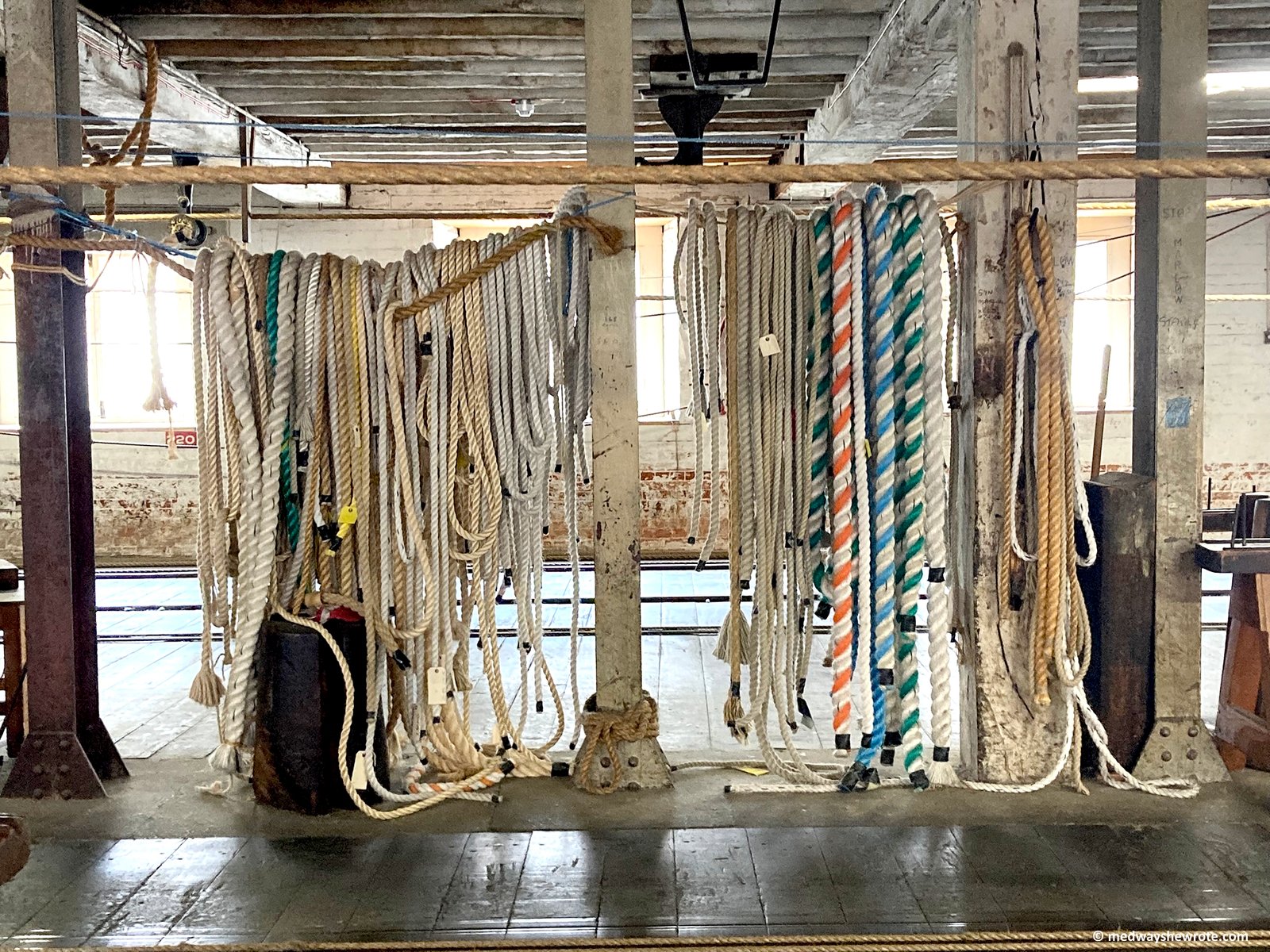 Ropes hanging in the Ropery at Chatham Dockyard.