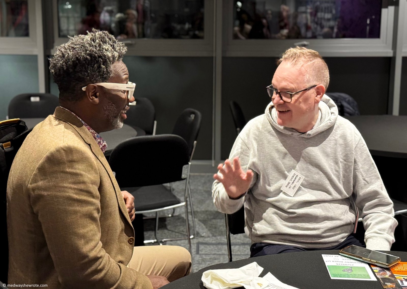 The Mayor of Medway, Douglas Hamandishe, talking to Read Easy Medway reading coach, Paul Ives at the Celebrating Reading in Medway event.